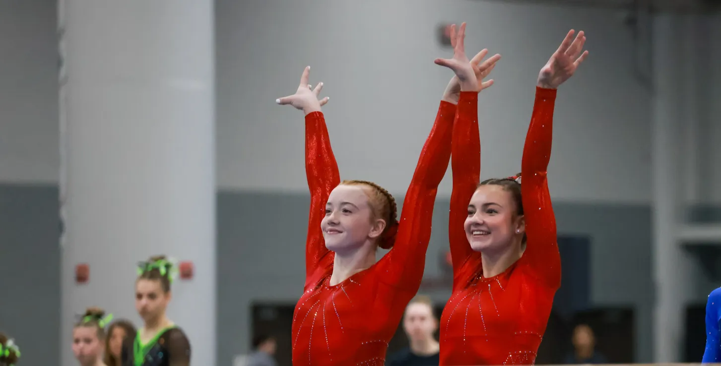 Chow's gymnasts salute at the Winter Classic